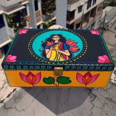 a painted box sitting on top of a building