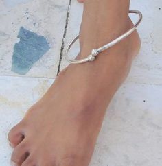 "Sterling silver hollow anklet /upper arm bracelet. easy to wear by twisting little across. simple design piece great for your jewellery collection, inner diameter-8.6 cm(3.44\") free size easy to adjust. thickness-3 mm, weight-13 grams(0.45 ounce). material-sterling silver." Adjustable Silver Nickel-free Anklets, Adjustable Silver Ankle Strap Jewelry, Silver Flexible Anklets For Summer, Silver Adjustable Flexible Bangle, Adjustable Flexible Silver Bangle, Minimalist Metal Bracelets For Summer, Summer Minimalist Metal Bracelets, Silver Flexible Bracelets, Adjustable Silver Ankle Wrap Anklet