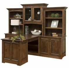 an office desk and hutch with bookshelves on each side, along with a lamp