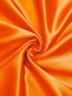 an orange fabric is shown in close up