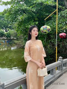 At Ao Dai by CuteSass, you will find the most stylish ao dai in wide size range and at reasonable prices. We are moving our ao dai collection from CuteSass here to provide you with the best experience.  You can read our 5000+ reviews at: cutesass.etsy.com ❣️ This set includes one Ao Dai Top Style: Modernized  Material: Chiffon. Non Stretch ❣️ This beautiful and modern ao dai set is perfect for any special occasions: Lunar NewYear, Mid Autumn Festival, Attending Wedding, or a Family photoshoot. ❣️ Please note: - There might be up to 10% color variance due to lightning and viewing devices  - Sizing may run 1-2 sizes smaller than American standard sizes, please refer to the sizing charts for sizing. - Please contact me if you have any questions ❣️We are proud to provide you with the highest q Elegant Short Sleeve Embroidered Ao Dai, Summer Embroidered Ao Dai, Elegant Full-length Ao Dai For Summer, Festive Long-sleeve Ao Dai With Floral Embroidery, Summer Long-sleeve Ao Dai With Floral Embroidery, Mid Autumn Festival, Lunar New, Unique Designers, Family Photoshoot