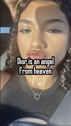 a woman sticking her tongue out with the words dior is an angel from heaven