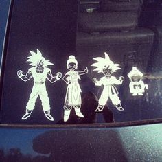 some stickers on the side of a car that has been decorated with cartoon characters