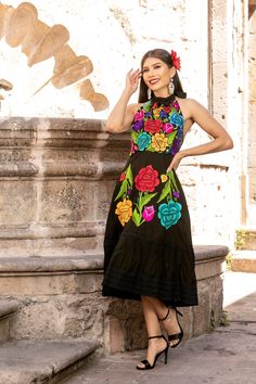 This Beautiful Mexican Floral Dress is the perfect dress for a special event or Mexican Fiesta. It reflects the Mexican culture through its unique embroidered design and vibrant colors. It has elastic on the back for an adjustable and comfortable fit.  It is embroidered by Artisanal Machine- hand manipulated by Mexican Artisans in Guanajuato, Mexico. It's made out of fresh Mexican Cotton and is full of embroidered multicolor flowers. Shop more Mexican Dresses here:  https://www.etsy.com/es/shop/ White Mexican Dresses For Women, Traditional A-line Embroidered Dress, Embroidered Multicolor Maxi Dress For Wedding, Multicolor Embroidered Maxi Dress For Wedding, Traditional Embroidered A-line Dress, Summer Embroidered Sleeveless Gown, Festive Sleeveless Floral Embroidered Dress, Multicolor Summer Dress For Celebration, Multicolor Party Dress With Intricate Embroidery