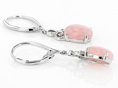 9x7mm cabochon oval Peruvian pink opal rhodium over sterling silver dangle earrings. Measures approximately 1 1/4"L x 1/4"W. Leverback closures. Elegant Pink Opal Jewelry For Formal Occasions, Elegant Formal Pink Opal Jewelry, Elegant Silver Jewelry With Pink Opal, Elegant Silver Pink Opal Jewelry, Elegant Pink Opal Oval Jewelry, Elegant Silver Oval Cabochon Earrings, Elegant Round Pink Opal Jewelry, Elegant Oval Cabochon Sterling Silver Earrings, Elegant Sterling Silver Oval Cabochon Earrings