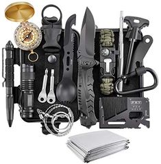 an assortment of tools and gadgets in a black case with gold accents on it