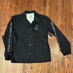 This Jacket Is In Perfect Condition! No Holes, Stains, Or Pulls Black Long Sleeve Windbreaker For Streetwear, Urban Style Black Waterproof Track Jacket, Nylon Tactical Long Sleeve Outerwear, Tactical Long Sleeve Nylon Outerwear, Tactical Nylon Outerwear With Long Sleeves, Black Windproof Long Sleeve Windbreaker, Black Long Sleeve Waterproof Track Jacket, Black Sports Outerwear With Pockets, Black Long Sleeve Techwear Windbreaker