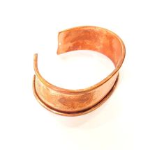 Nickel Free and Lead Free Material : Copper Color: Copper Size : 20mm Blank Size : 16.5mm Quantity : 10 pcs. To see other all Rhodium Plated Bracelet Blanks please click below https://www.etsy.com/shop/AZsupplies?search_query=Rhodium+bracelet+blank To see other all Silver Bracelet Blanks please click below https://www.etsy.com/shop/AZsupplies/search?search_query=bracelet+blank+silver&order=date_desc&view_type=list&ref=shop_search To see other all Gold Bracelet Blanks please click bel Bronze Cuff Bracelet As Gift, Bronze Cuff Bracelet For Gift, Copper Cuff Bracelet Gift, Adjustable Bronze Bracelet, Adjustable Bronze Round Bracelet, Adjustable Bronze Cuff Jewelry, Adjustable Round Copper Cuff Bracelet, Adjustable Copper Cuff Bracelet, Silver Copper Cuff Jewelry