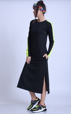 Black Casual Dress with Neon - METD0142 Favorite black dress with a statement neon line on the sleeve - just look at this piece! This is the perfect everyday dress which can be worn on many occasions and combines with different accessories turn from sport to elegance. The length is under the knee with free and loose fit and a straight silhouette. There are two slits on the sides as well as two side pockets for more comfort. This casual dress is made of cotton. SUBSCRIBE TO OUR NEWSLETTER AND REC Dress Black Casual, Neon Dress, Black Dress With Pockets, Black Chiffon Dress, Neon Dresses, Everyday Dress, Casual Dress Black, Tunic Tops Casual, Rave Outfit