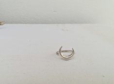 Crescent Moon Ring, Statement Ring, Horn Ring, Boho Rings A gorgeous minimal moon ring in sterling silver. This dainty ring is perfect for worn alone for a statement minimalistic look, or for stacking with other rings. The moon is welded slightly asymmetric (not flat) to the band ring - see pic's - as to reinforce the unique design. º ☆ Details ☆º ☆ Crafted in 925 sterling silver. Nickel free. ☆ Comes beautiful packaged, in our branded Tiny Jewelry Box. Gift Ready. ☆ Peacefully handemade with ti Moon Phase Ring, Jewelry Box Gift, Horn Ring, Tiny Jewelry, Crescent Moon Ring, Moon Ring, Box Gift, Dainty Ring, Moon Phases