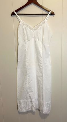 Like new! This white vintage slip dress looks like it's never been worn. Very light cotton polyester blend fabric with cute lace accents and flattering seams. The straps are adjustable. Tag says size 36 but see measurements below.  Approx:  18.5" pit to pit 42" length (somewhat adjustable bc of straps) 17.5" across seam under chest Cotton Slip Dress, Vintage Slip Dress, Vintage Slip, Cotton Slip, Vintage Slips, Cotton Lights, Austin Tx, Dress Clothes For Women, Dream Life