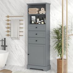 a bathroom with marble walls and flooring, including a gray cabinet in the corner