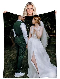 a bride and groom are holding up a wedding photo with the same image on it