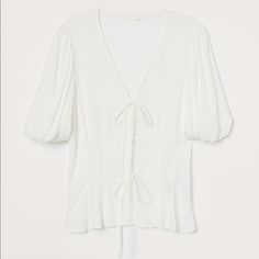 Nwt Beautiful White Blouse. Button And Tie Details. Size Xl Elegant Puff Sleeve Button-up Top, H&m V-neck Tops For Daywear, V-neck Blouse With Buttons For Brunch, H&m Tops With Button Closure For Daywear, H&m Button-up Blouse With Button Closure, Chic Button-up Puff Sleeve Top With Button Closure, Classic H&m Blouse For Spring, Classic Spring Blouse By H&m, Classic H&m Spring Blouse