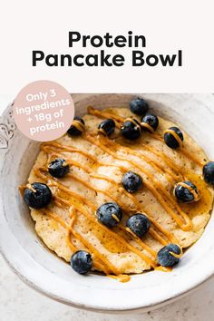 a bowl filled with pancakes covered in blueberries