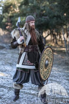 Limited Edition Embroidered Woolen Viking Kaftan “Sigfus the Shield” for sale. Available in: dark brown wool :: by medieval store ArmStreet Knotwork Viking, Winter Viking, Nordic Clothing, Viking Outfit, Wolf Embroidery, Viking Cosplay, Viking Garb, Viking Reenactment, Leather Bracers