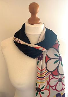 Add a bit of luxury to your wardrobe with this handmade vintage kimono fabric  and silk velvet scarf! The scarf is black silk velvet one one side and a traditional Japanese silk kimono fabric on the other . The silk kimono is unique and is taken from the sleeve of a kimono that dates back to the 1960's. It is a soft and crepe silk which features a traditional flower pattern.  This is a one-off design so is unique! The scarf is lightweight and has a very beautiful drape which allows it to be tied Traditional Black Silk Scarves, Black Silk Scarves As A Gift, Traditional Black Silk Scarf, Black Artistic Silk Scarf, Artistic Black Silk Scarves, Artistic Black Silk Scarf, Black Bohemian Silk Scarf, Black Silk Bohemian Shawl, Vintage Black Silk Scarf Gift