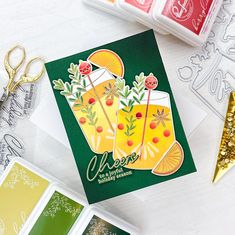 some cards and scissors on a table