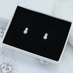 A cute pair of tiny sterling silver pineapple stud earrings Top Ear Piercing, Silver Logo, Mismatched Earrings, Gift Wrapping Services, White Gift Boxes, Huggie Hoop Earrings, Free Gift Wrapping, Birthstone Necklace, Ear Piercings