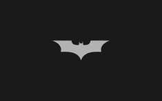 the dark knight logo is shown in black and white, as well as an image of batman