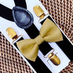 Gold Bow Tie & Black Suspenders with Gold Clips: Our bow tie & suspenders are a great choice for family photos, wedding, ring bearer outfit, birthday celebration or any other special occasion. ❤ **Please Specify Above**  SET- Bow Tie and Suspenders SUSPENDERS- One Pair of our Quality Suspenders BOW TIE- One Bow Tie on white elastic strap or alligator clip Small: 6 months- 6 years Medium: 7 years- 12 years Adult: 13 years- Up To 6ft tall Big & Tall: Adults Over 6ft Tall //SHIPPING// It takes 1-3 Classic Suspenders For Suit And Tie At Party, Elegant Suspenders For Party Suit Accessories, Gold Suit And Tie Accessories For Wedding, Adjustable Gold Bow Tie For Black Tie Events, Fitted Gold Bow Tie For Wedding, Elegant Adjustable Belts And Suspenders For Wedding, Elegant Black Belts And Suspenders For Party, Adjustable Gold Bow Tie, Bow Tie And Suspenders Set For Father's Day Party