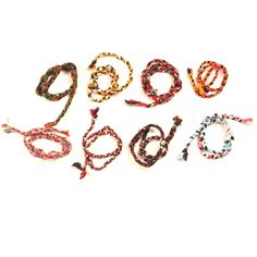 six different colored rope bracelets with the word go out written on them in black, white