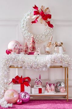 a christmas display with pink and white decorations