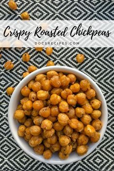 crispy roasted chickpeas in a white bowl on a black and white checkered tablecloth