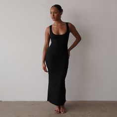 Experience ultimate comfort and style with our Staple Ribbed Maxi Dress. Made with stretchy and ribbed fabric, this versatile dress will hug your body in all the right places. Perfect for any occasion, you'll feel both comfortable and chic all day long. Runs true to size Model is wearing a size S Stretchy Made of Cotton, Poly, and Spandex Long Runs, Ribbed Maxi Dress, Maxi Dress Black, Versatile Dress, Versatile Dresses, Hug You, Zambia, Equatorial Guinea, Ribbed Fabric