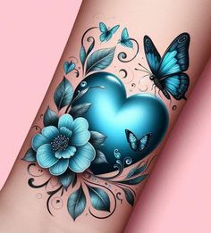 a blue heart tattoo with butterflies and flowers on the side of its arm, next to a pink background