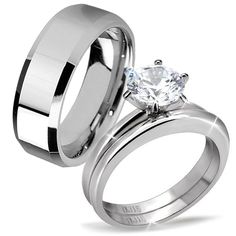 two wedding rings that are next to each other, one with a diamond on it