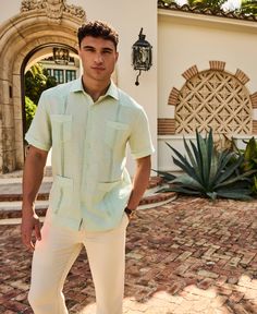 This Cubavera men's short sleeve guayabera is a classic blend of comfort and style. Crafted from 100% durable, plain weave linen, it features short sleeves and the traditional four-pocket design. This button-up dress shirt encapsulates timeless guayabera styling, making it a versatile addition to any wardrobe. The perfect fusion of tradition and elegance, this shirt effortlessly elevates your casual or formal looks. 100% Linen Classic Fit Lightweight and Breathable Linen Plain Weave Fabrication For Durability Point Collar For A Polished Look Four Pockets For Classic Guayabera Styling Short Sleeves Machine Wash Imported | Cubavera Men's Four-Pocket Guayabera Short Sleeve Shirt in Aqua Foam Green, Size Small, 100% Linen Men Outfits Formal Wedding, Small Wedding Groom Outfit, Garden Party Dress Code Men, Beach Wedding Guest Men, Mens Summer Wedding Attire Guest, Garden Wedding Mens Attire, Guayabera Outfit For Men, Casual Wedding Attire For Men