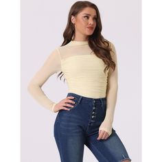 This mesh top is designed to add a touch of edgy sophistication to any outfit. A must-have option for the new season, which can add new styles to your wardrobe. Suitable for spring, autumn, winter, and many occasions, such as work out, office, daily wear, meetings, shopping, party, and so on. Style it with a pair of jeans, or casual pants for a stylish look. Trendy Sheer Stretch Top, Casual Blouse With Mesh Sleeves, Fitted Mesh Top With Sheer Sleeves For Casual Wear, Chic Spring Tops With Mesh Sleeves, Fitted Mesh Tops For Fall, Trendy Stretch Tops With Mesh Sleeves, Casual Tops With Mesh Sleeves, Casual Fitted Top With Sheer Sleeves, Trendy Tops With Sheer Sleeves