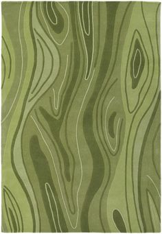 a green rug with wavy lines on it