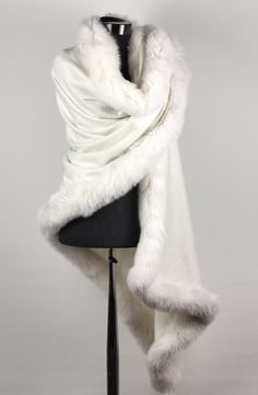 Get cozy in a versatile Fox Fur Blanket Shawl in Off White for women. The soft cashmere wool body has fox fur trim all around the entire accessory for a glam appeal. Fashionable really elegant, it is luxurious soft incredibly warm wrap. The Fur trim is hand-stitched all around shawl. Designed to keep you warm & feeling cozy! >Feeling: Soft >Condition: Brand New >Materials: Cashmere Shawl - Fox Fur >Length: 190 Cm / 74 inch >Width: 75 Cm / 29 inch >Care instructions: Dry Cle Elegant Fitted White Shawl, Cashmere Scarf Women, Elegant Shawl, Blanket Shawl, Viking Dress, Burlesque Costume, Winter Shawl, Fur Wrap, Fur Shawl