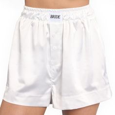 PRICES MAY VARY. Bridal Bliss: Have some fun in our white satin boxer shorts featuring a white woven tag with black BRIDE text. For Every Bride: Our premium boxer shorts come in 3 sizes - Small, Medium, and Large! Ultimate Comfort: We made the *comfiest* shorts ever to support you all bach long! Made of 5% Spandex and 95% Polyester. Easy Care: We kept it super easy for the bride to be. Simply machine wash cold + tumble dry! Cute Stuff Inside: and outside, too! Every sandal comes gift-ready for y Last Sail Bachelorette Party, White Satin Bottoms For Wedding, White Satin Bottoms For Summer, White Satin Wedding Bottoms, Fitted White Satin Bottoms, White Satin Sleepwear For Pajama Party, Fitted White Bottoms For Pajama Party, White Fitted Sleepwear For Wedding Night, White Short Sleepwear For Pajama Party