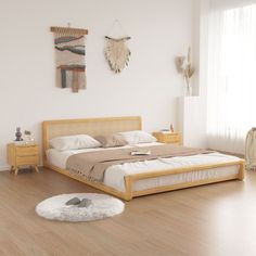 a bed room with a neatly made bed and two nightstands