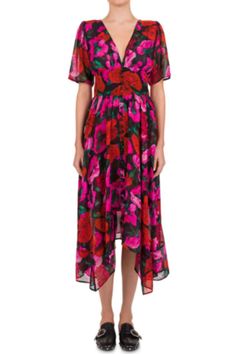 Bethany Joy Lenz can be seen wearing this beautiful silk floral dress in the final scenes of the Hallmark movie A Valentine's Match. This Floral silk crepe dress has concealed hook and eye and zip fastenings at the back. The dress has a plunge V-neck, short puff sleeves, non-functioning button trim on the front with a handkerchief hem. Partially lined. Size on Label: 3Please note this brand uses sizing 1-4. A Size 3 is considered a US Medium or Large also equivalent to a 29-30 pant size. For mor Summer Silk Dress With Floral Print For Daywear, Silk Buttoned Dress For Spring, Silk Daywear Dresses With Buttons, Spring Silk Dress With Buttons, Silk Crepe Dress, Joy Lenz, Designer Dresses Gowns, Bethany Joy Lenz, Bethany Joy