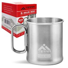 a stainless steel mug next to a box