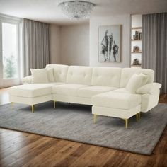 a living room with a large white sectional couch