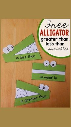 three alligator paper cutouts with the words free and greater than one is equal to another