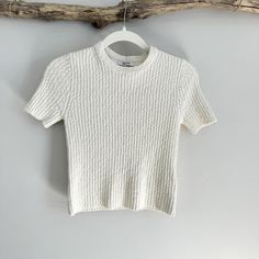 Madewell Boucl-Knit Crewneck Sweater Tee Nwt Size Xxs (Very Stretchy, I’m Normally A S/M And This Worked For Me, However It Is Fitted) Msrp $65 Elevate Your Wardrobe With This Cozy Cream Ribbed Knit Short Sleeve Top. Perfect For Layering Or Wearing On Its Own, This Stylish Piece Offers A Comfortable Fit And A Versatile Look. Crafted From Soft, Breathable Fabric, This Top Provides Both Comfort And A Chic Aesthetic. The Ribbed Texture Adds A Unique Touch, While The Lightweight Material Ensures You Madewell Sweater, Look Short, Knit Shorts, Crew Neck Sweater, Madewell, Sweater Top, Breathable Fabric, Ribbed Knit, Short Sleeves Tops