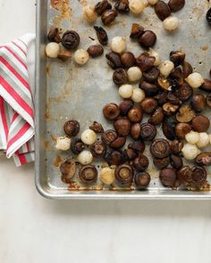 roasted mushrooms on a baking sheet ready to go into the oven