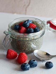 raspberry chia pudding in a jar with spoons