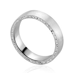 a white gold wedding ring with diamonds on the outside and inside, set in 18k white gold