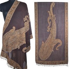 This jamavar scarf is crafted from soft, luxurious wool and features an intricate jacquard weave forming a bold yet elegant paisley pattern. The base color is a rich cocoa brown that provides a warm, earthy backdrop for the paisley design. The large paisley motifs make a striking visual statement, rendered in shades of tan, chocolate, and beige for beautiful depth and dimension. The skilled artistry of the jacquard weaving process translates the paisley artwork into the very fabric of the shawl, Luxury Shawl With Self Design For Festivals, Winter Paisley Print Pashmina Shawl, Winter Pashmina Shawl With Paisley Print, Brown Paisley Pashmina Shawl, Brown Pashmina Shawl With Paisley Print, Festive Jamawar Scarves With Paisley Print, Pashmina Rave, Festival Scarf, Festival Scarves