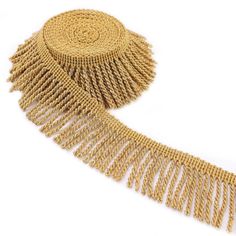 a gold necklace with fringes is shown on a white background and it's made from