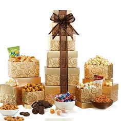 an assortment of snacks and treats are arranged on top of each other, including chocolates