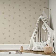 a baby's room decorated in neutral colors