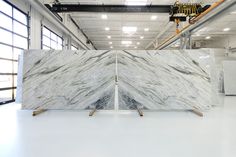 a large marble counter top in a warehouse